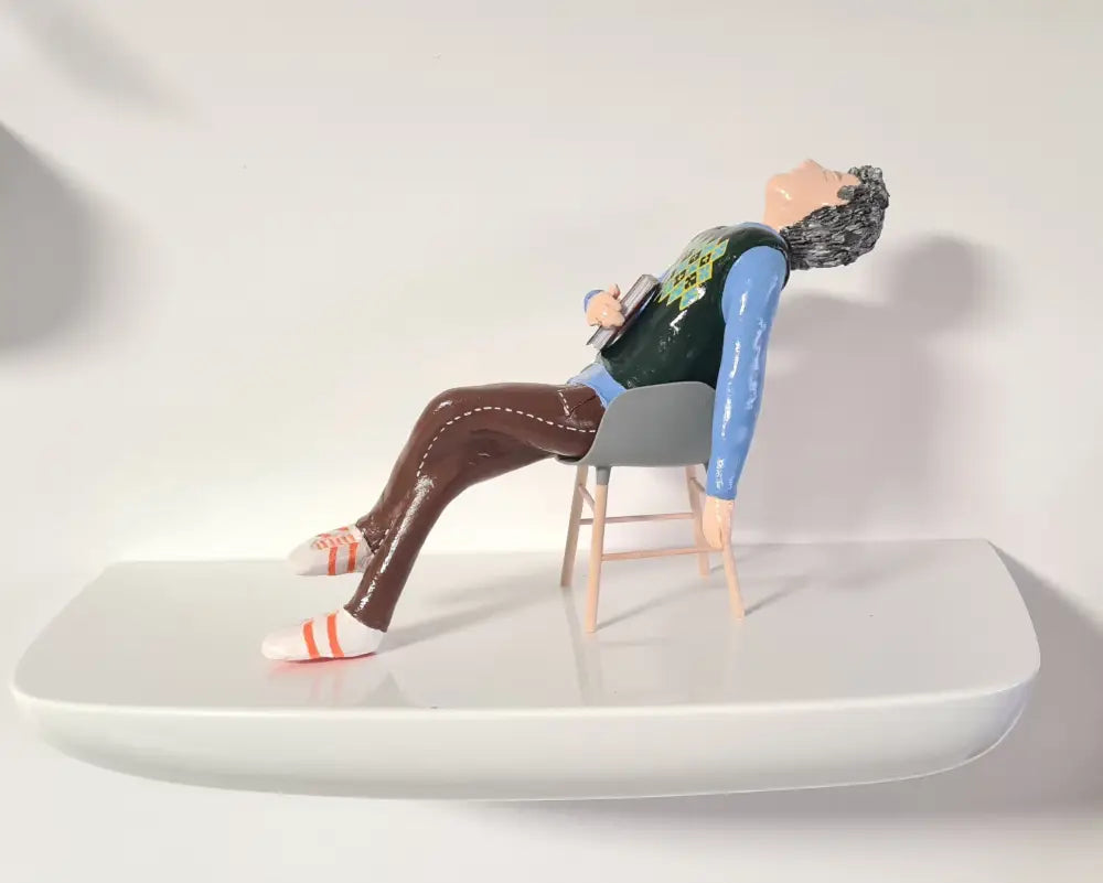 Sleeping man on a chair איש ישן על כסא Armchair