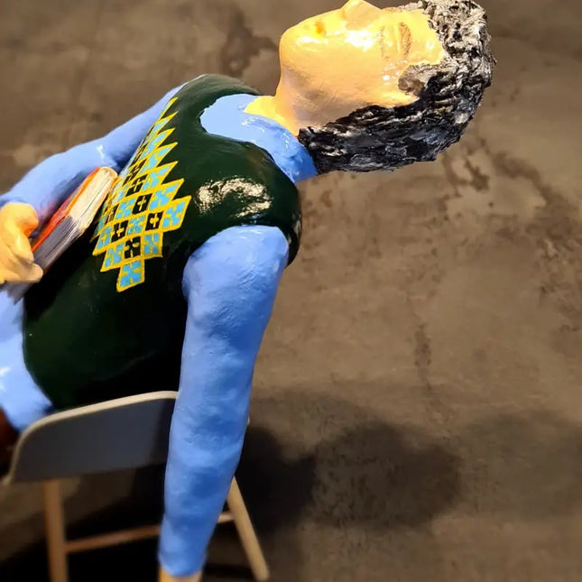 Sleeping man on a chair איש ישן על כסא Armchair