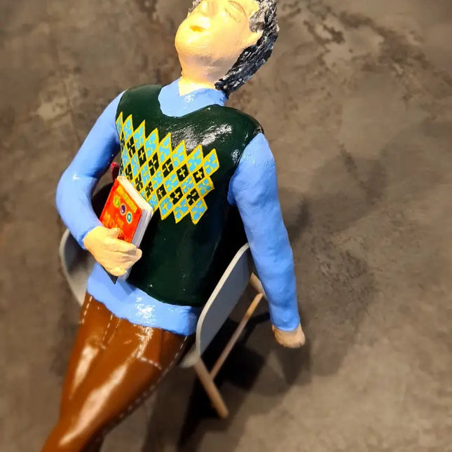 Sleeping man on a chair איש ישן על כסא Armchair